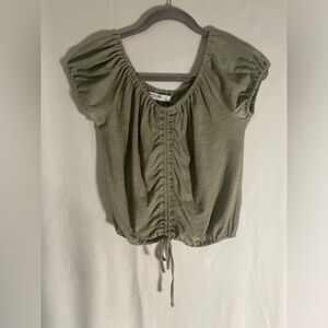 Safe green bow top.